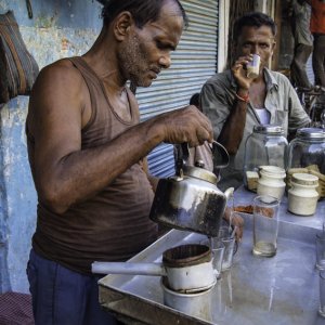 Man pouring Chai