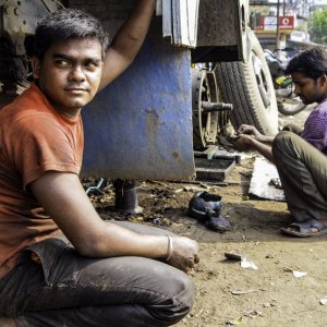 Men repairing truck