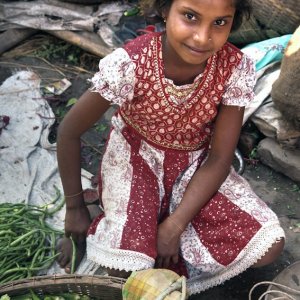 Girl selling Okra
