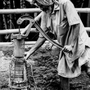 Man collecting water
