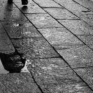 Figure in puddle