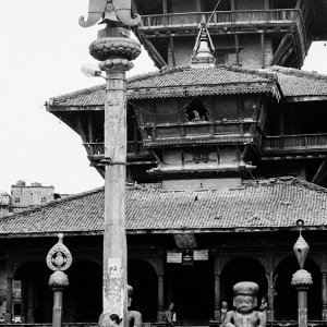 Woman in front of Hindu temple