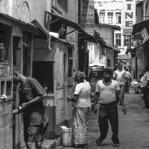 People in narrow street