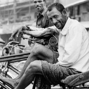 Smile of resting rickshaw wallah