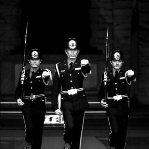 Guardsmen raising their arms