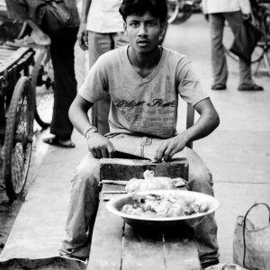 Man precooking by the roadside