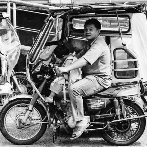 Father and son on trishaw
