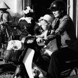 Mother and her daughter on motorbike