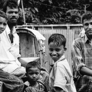 Men and boys around cycle rickshaw