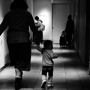 Mother and daughter walking hand in hand