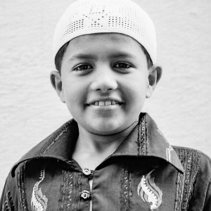 Boy wearing Taqiyah