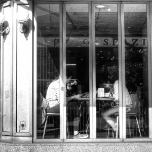 two girls sitting in cafe
