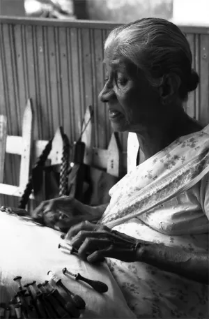 Older woman doing lacework