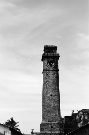 Darkish clock tower rising in Galle