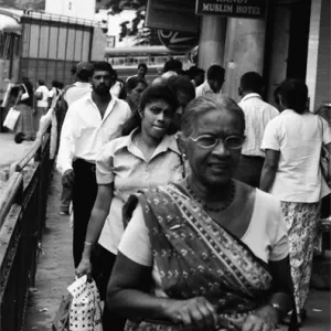 Woman walking with wearing saree