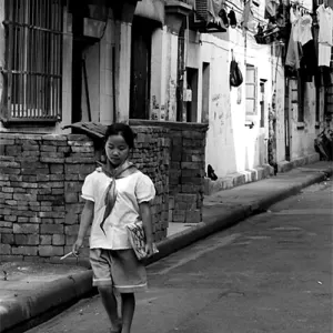Girl walking lane with school uniform