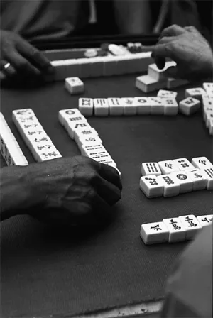Local people playing Mahjong in lane