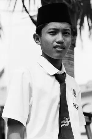 School boy wearing Songkok
