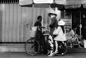 Mother and daughter on same bicycle