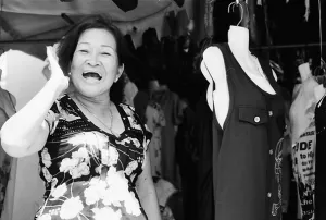 Cheerful woman in boutique