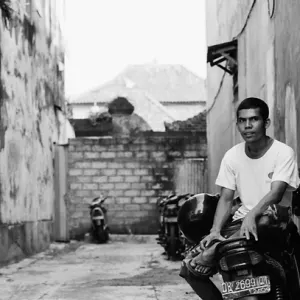 Man sitting on motorbike