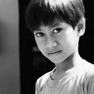 Boy with long-slitted eyes