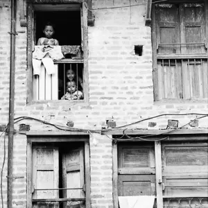Mother and kids by window