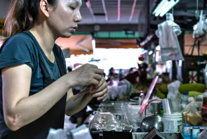 Woman working in food stall