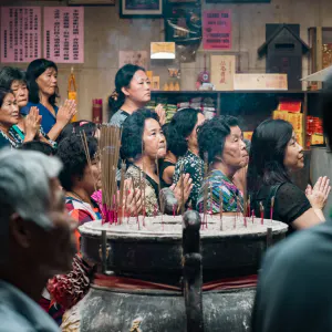 People around incense burner in Shiluodian