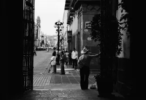 Man standing in street corner