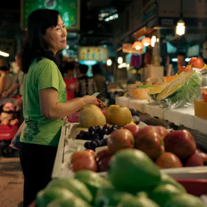 Smiling woman in fruit store