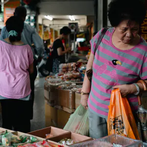 Woman browsing through the products on display