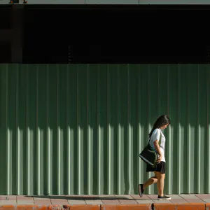 girl walking with head down