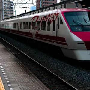 Express train passing Higashi Mukoujima station