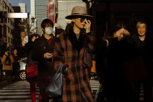 Woman wearing hat and sunglasses