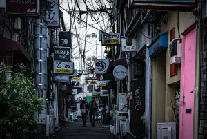 Many signboards in lane called Golden Gai