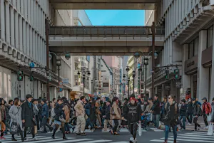 Crowds crossing the street