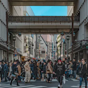 Crowds crossing the street