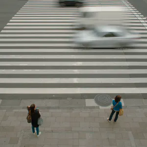 Three women at stoplight