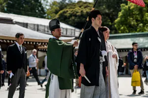 bridal couple and Shinto priest