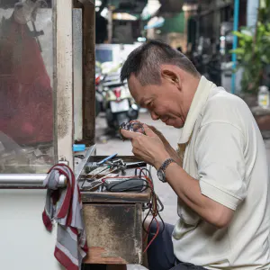 Man repairing watch