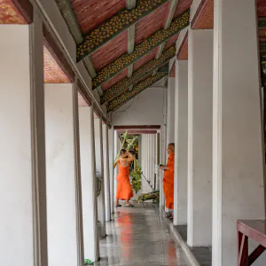 Monks at end of corridor