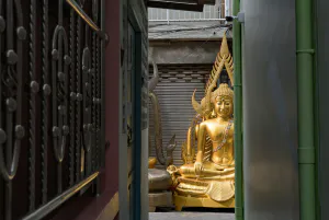 Buddha statue at end of lane