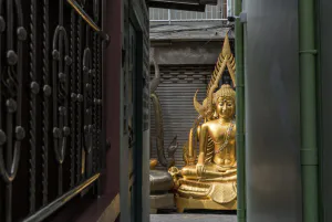Buddha statue at end of lane