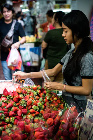 Woman selling strawberry