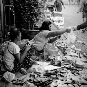 Women selling sandals