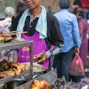 Man cooking in food stall