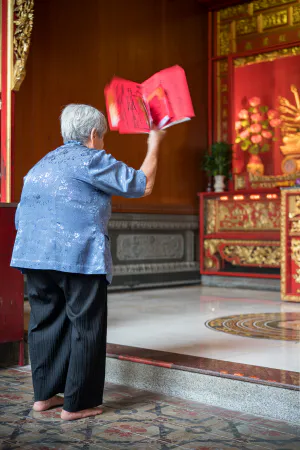 Older woman praying