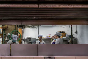 Men working in kitchen