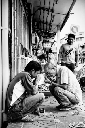 Men being bent on Phra Kruang